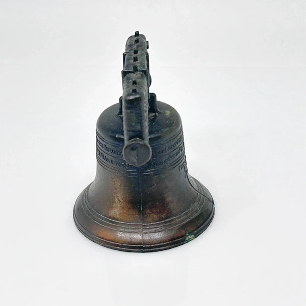Bring a touch of American history to your home with this charming, miniature metal replica of the iconic Liberty Bell. Standing at a delightful 2.5 inches tall, this piece beautifully captures the essence of freedom and independence, a symbol that has resonated since the American Revolution.
