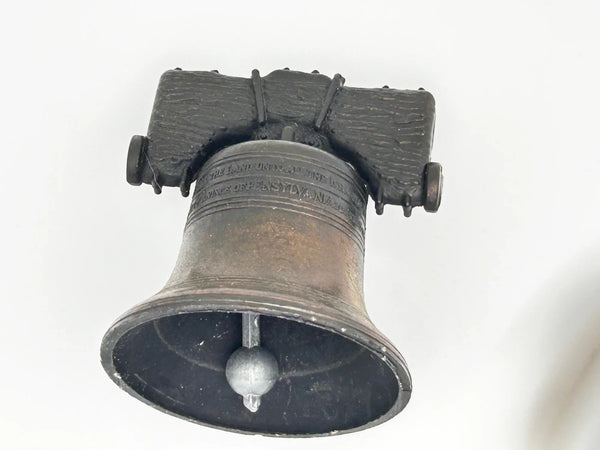 Bring a touch of American history to your home with this charming, miniature metal replica of the iconic Liberty Bell. Standing at 2.5 inches tall, this piece beautifully captures the essence of freedom and independence, a symbol that has resonated since the American Revolution.