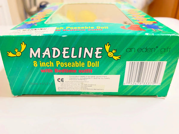 From Eden Toys, Inc., comes this 8" poseable Madeline doll, complete with her school dress, blue coat, socks, shoes, pantes and iconic yellow hat. night clothes. Attention to detail shows in the appendix scar described in the books and fully combable hair. She also has a change of night clothes, a blue nightgown and white slippers.