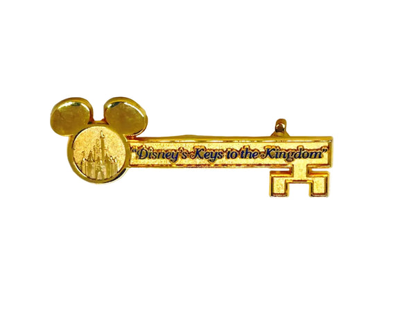 This enchanting gold-tone pin celebrates one of Disney's most exclusive experiences! This is a gold-tone souvenir pin given to guests who take the "Keys to the Kingdom" backstage walking tour at Magic Kingdom in Walt Disney World.background