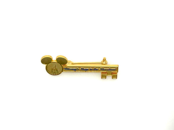 This enchanting gold-tone pin celebrates one of Disney's most exclusive experiences! This is a gold-tone souvenir pin given to guests who take the "Keys to the Kingdom" backstage walking tour at Magic Kingdom in Walt Disney World.