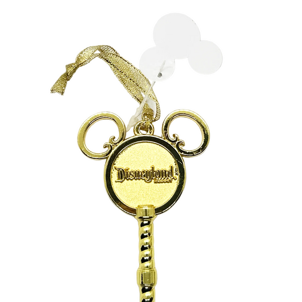 Perfect for Disney fans and collectors: our Walt Disney Parks Disneyland Sleeping Beauty Golden Castle Key Ornament provides a charming, golden keepsake. Shop today!