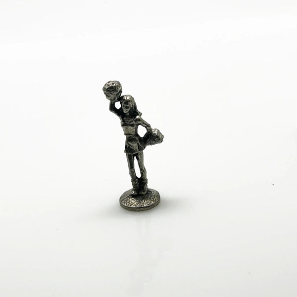 These are pewter tokens from a NFL Collector's Edition of the Monopoly board game, such as the 1998 or 2004 version.;The set includes miniature pewter figures of football players, a cheerleader, a football helmet, a football, and a whistle. I believe they were the Seattle Seahawks version.They are popular replacement parts for enthusiasts collecting specific themed Monopoly sets.