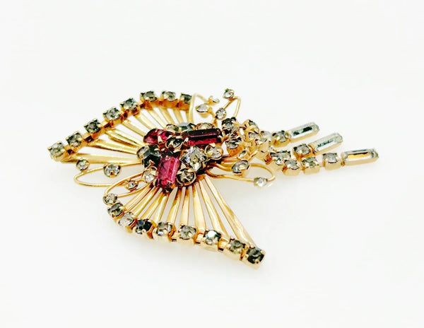 Introducing the M&amp;S 1/20 12kt G.F. Abstract Butterfly Brooch/Pendant — the perfect vintage solution to your style dilemmas. This exquisite butterfly brooch pendant highlights delicate abstract artistry paired with shimmering grey and purple/pink rhinestones