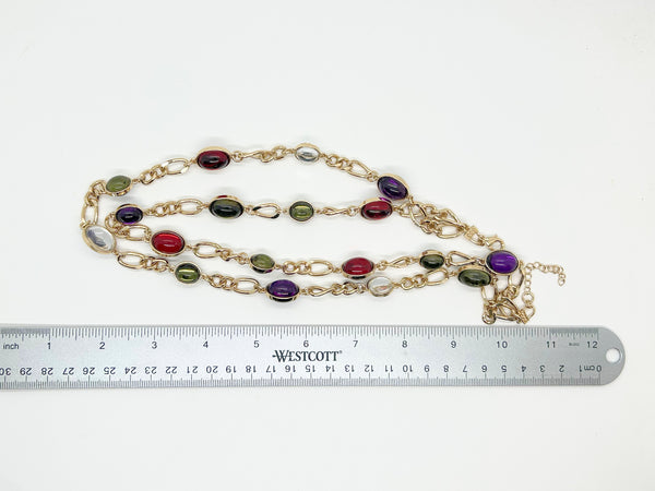 Vintage double strand station necklace with multicolor jewel-tone cabochons on a gold-tone chain link