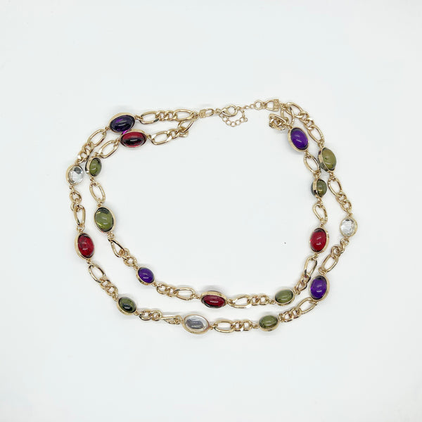 Vintage double strand station necklace with multicolor jewel-tone cabochons on a gold-tone chain link