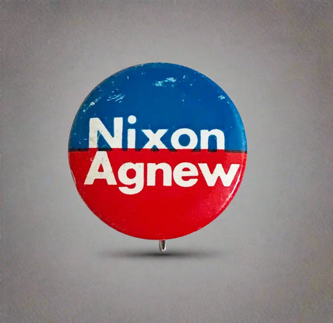 Celebrate a pivotal moment in American political history with the Nixon-Agnew Pin Back from the 1972 presidential campaign. Featuring bold red and blue colors with crisp white lettering, this vintage pin showcases the names of incumbent President Richard M. Nixon and Vice President Spiro Agnew, representing the Republican Party. 
