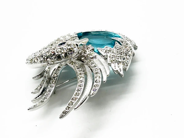 Perfect for collectors and style enthusiasts: our Showstopper Brooch provides timeless elegance and a stunning sculptural swan design. Shop today!