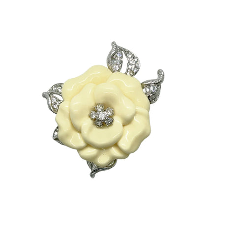 Perfect for those who appreciate timeless glamour: our Nolan Miller Lara Camellia Brooch provides a creamy flower brooch with sparkling elegance. Shop today!