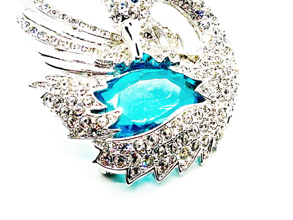 Perfect for collectors and style enthusiasts: our Showstopper Brooch provides timeless elegance and a stunning sculptural swan design. Shop today!