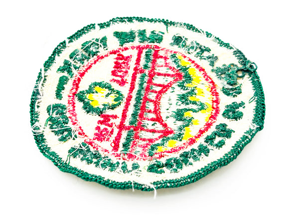 Embroidered patch with 'Girl Scout Council of Greater New York' logo on a white background