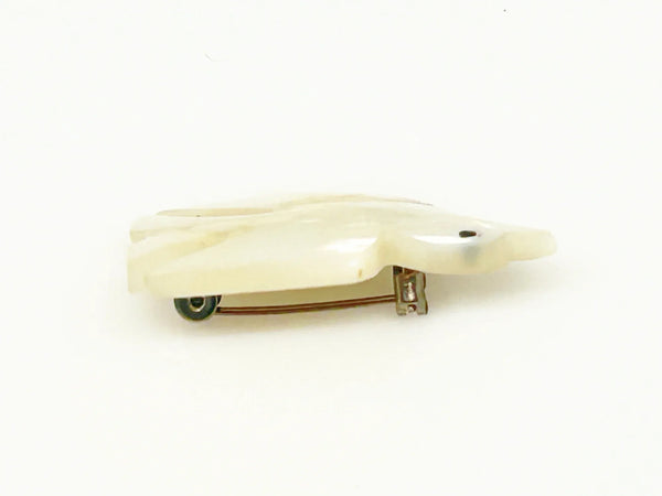 Perfect for vintage jewelry lovers: our Hand Carved Vintage Mother of Pearl Peace Dove Pin- 1960s provides a timeless symbol of peace. Shop today!