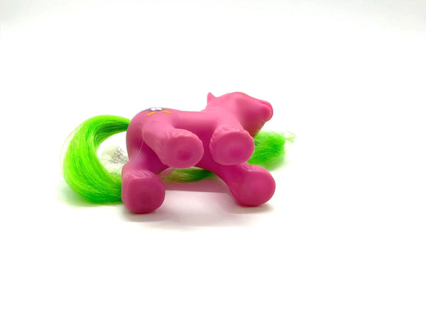 This is a vintage "Baby Waddles" My Little Pony , G1 figure , specifically part of the "Playtime Baby Brother Ponies" set released by Hasbro in 1988-1989