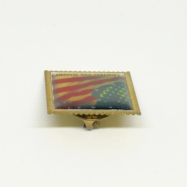  A perfect replica of the 34 cent stamp, reminiscent of a time before Forever stamps, this pin was created by the United States Post Office to showcase and honor our Flag. 