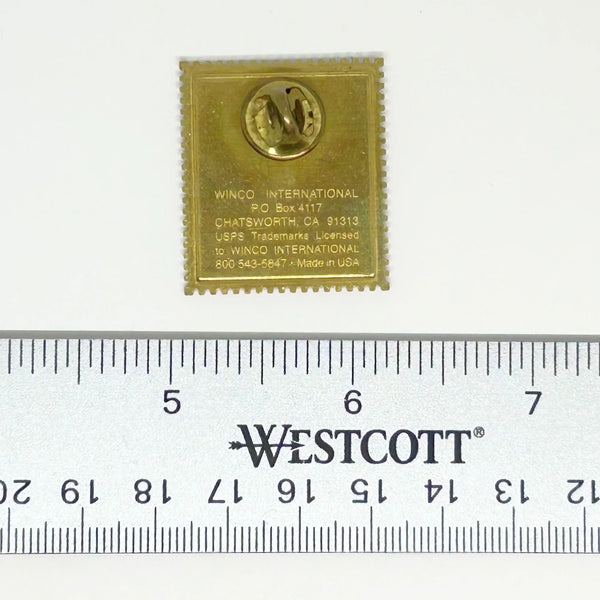  A perfect replica of the 34 cent stamp, reminiscent of a time before Forever stamps, this pin was created by the United States Post Office to showcase and honor our Flag. 
