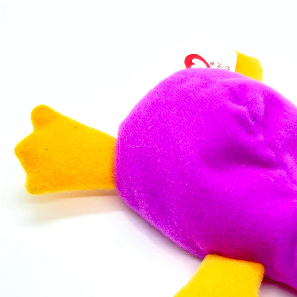 Purple plush toy with yellow accents on a white background