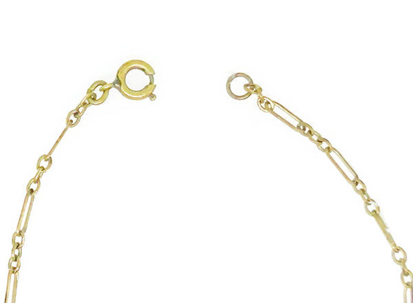 Enhance your jewelry collection with this one-of-a-kind standout piece. Adorned with intricate filigree and glistening purple stones, this necklace exudes elegance and charm. The centerpiece, a stunning diamond-shaped violet stone set in an ornate oval frame, adds a touch of luxury to any outfit