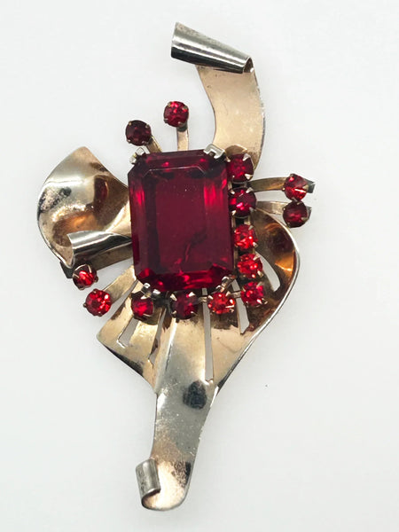 Mid Century Sterling Statement Brooch with Vivid Red Stones - Make a dramatic statement with this vintage brooch featuring a brilliant ruby red center stone. Shop now!