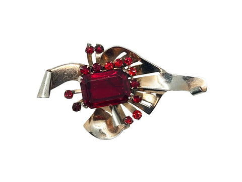 Mid Century Sterling Statement Brooch with Vivid Red Stones - Make a dramatic statement with this vintage brooch featuring a brilliant ruby red center stone. Shop now!