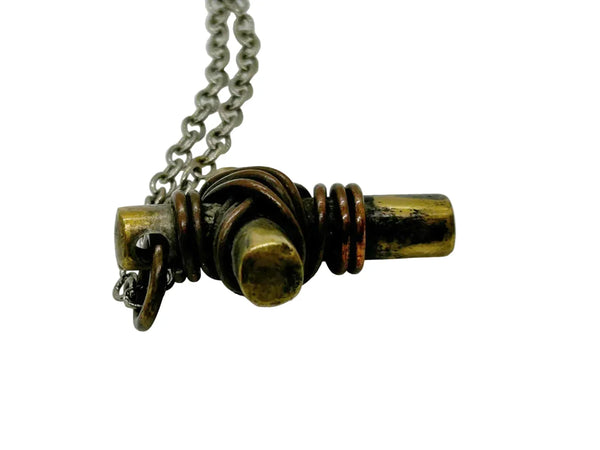 Experience the feeling of strength from the Vintage Rugged Brass Cross Necklace, exuding a bold, rugged aesthetic. With a simple yet substantial design, this pendant features dark metal strands encircling its center. 