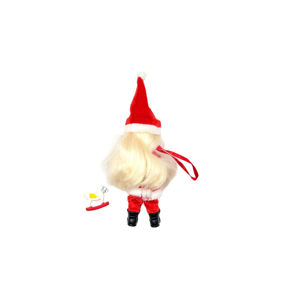 Vintage 2000s Mattel Barbie Kelly Club Santa Claus holiday tree ornament doll seen from the back, highlighting blonde hair, red outfit, black boots, hanging loop, and miniature white sleigh accessory