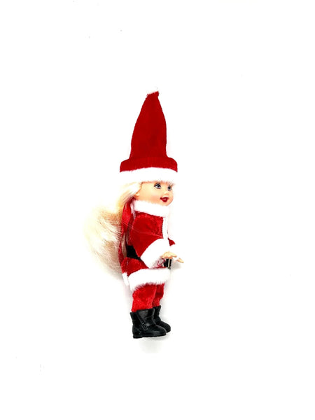 The 2003 Mattel Barbie Kelly Club Santa Claus ornament doll (Model #B1347) is a 4 to 5-inch collectible fashion doll featuring&nbsp;Barbie's younger sister, Kelly, dressed in a red and white Santa-inspired outfit, complete with a long red hat, black boots, and a black belt.