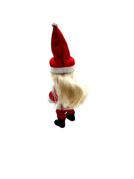 The 2003 Mattel Barbie Kelly Club Santa Claus ornament doll (Model #B1347) is a 4 to 5-inch collectible fashion doll featuring&nbsp;Barbie's younger sister, Kelly, dressed in a red and white Santa-inspired outfit, complete with a long red hat, black boots, and a black belt.