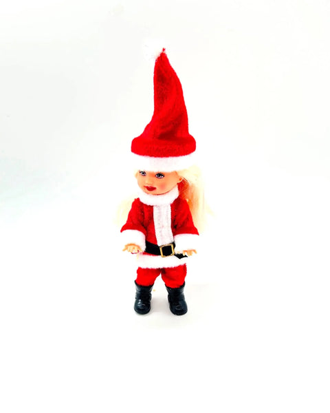 The 2003 Mattel Barbie Kelly Club Santa Claus ornament doll (Model #B1347) is a 4 to 5-inch collectible fashion doll featuring blonde hair and blue eyes.
