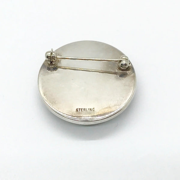 This delightful sterling silver set features an adorable black Scottie dog that's ready to prance right into your jewelry collection! The charming brooch pin (1 1/8" x 1 1/8") adds a playful pop to any dress, sweater, blouse, or scarf, while the matching pierced post earrings (approximately 1 3/4" long) complete the look with tail-wagging style.