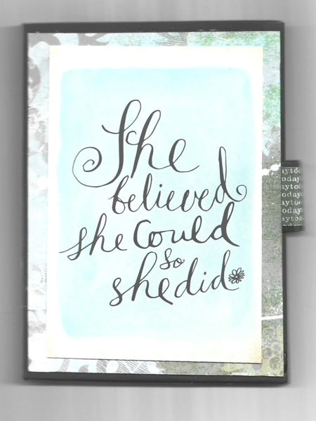 Celebrate determination and achievement with the She Believed Mini Album, a beautifully handcrafted journal that inspires and motivates. This carefully designed keepsake features intricate details, multiple slots, and inserts to hold cherished memories, including two additional mini journals tucked inside