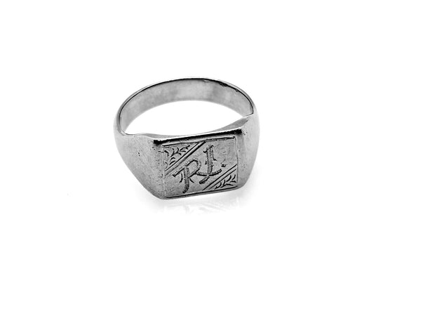 A silver signet ring with engraved initials 'RJ' on a polished band, shown on a clean white background.