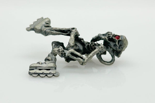 Skeleton with Red Eyes, on Rollerblades Pendant - Lamoree’s Vintage