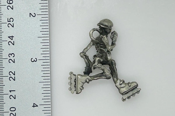 Skeleton with Red Eyes, on Rollerblades Pendant - Lamoree’s Vintage