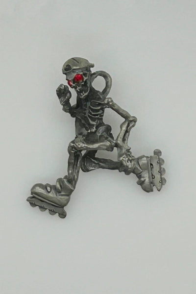 Skeleton with Red Eyes, on Rollerblades Pendant - Lamoree’s Vintage