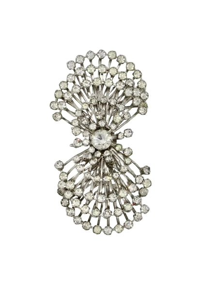 Perfect for vintage jewelry lovers: our Sparkling Vintage Atomic Silvertone Rhinestone Pin provides layered brilliance and a unique, eye-catching look. Shop today!