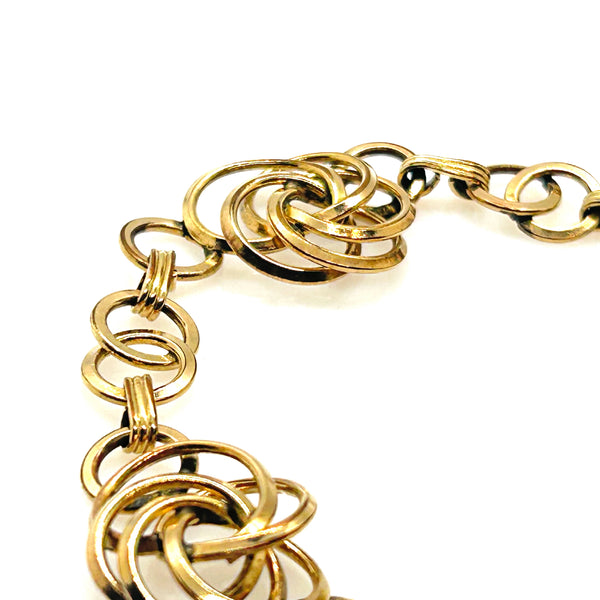 Vintage Gold Tone Multi-Ring Swirl Love Knot Bracelet & Screw Back Earrings Demi Parure Set