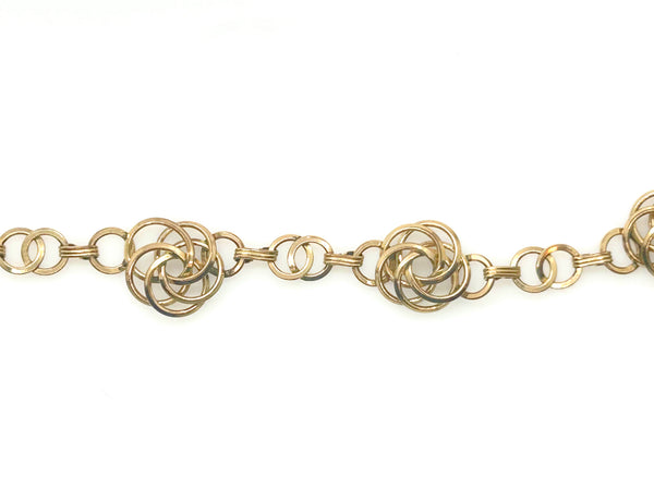 Vintage Gold Tone Multi-Ring Swirl Love Knot Bracelet & Screw Back Earrings Demi Parure Set