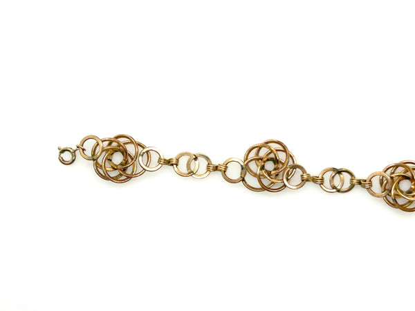 Vintage Gold Tone Multi-Ring Swirl Love Knot Bracelet & Screw Back Earrings Demi Parure Set