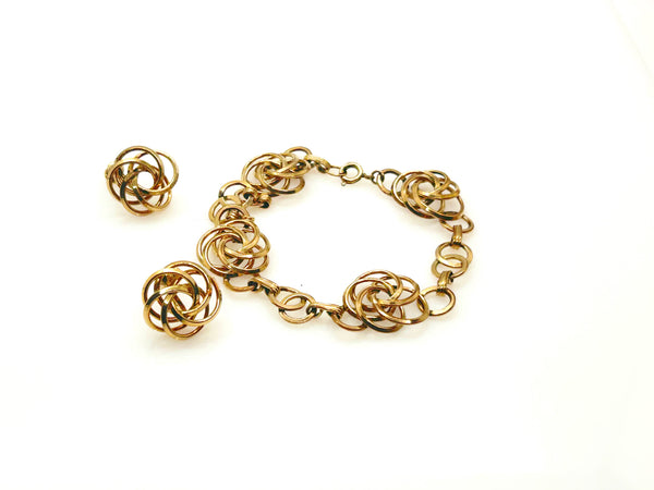 Vintage Gold Tone Multi-Ring Swirl Love Knot Bracelet & Screw Back Earrings Demi Parure Set