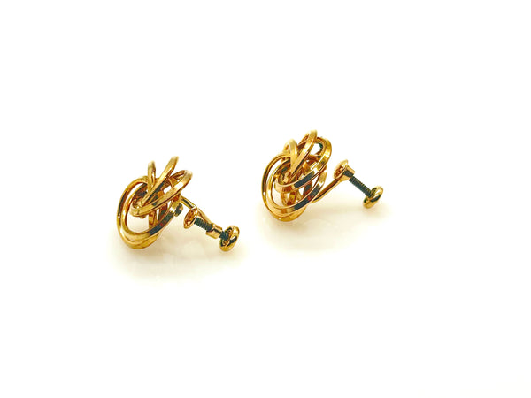 Vintage Gold Tone Multi-Ring Swirl Love Knot Bracelet & Screw Back Earrings Demi Parure Set