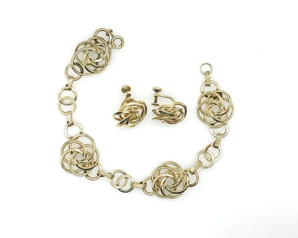 Vintage Gold Tone Multi-Ring Swirl Love Knot Bracelet & Screw Back Earrings Demi Parure Set