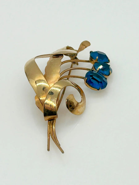 Striking Gold Filled and Oval Blue Faceted Vintage Flower Brooch