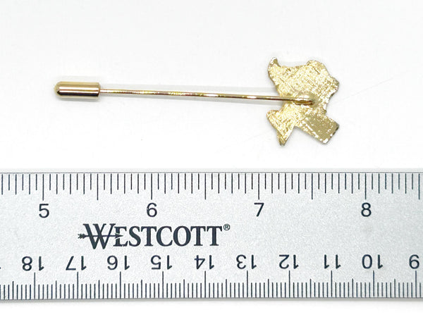Gold-tone Texas state-shaped stickpin from the 1970s, featuring a polished silhouette mounted on a secure needle with protective clutch. Measures 2.5" excluding cap. Vintage lapel pin or tie tack perfect for adding Texas pride to any outfit.