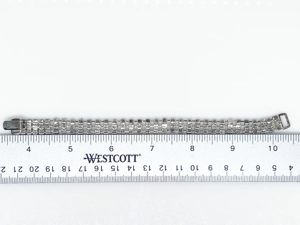 Perfect for vintage bracelet lovers: our Stunning Vintage Three Row Rhinestone Bracelet provides refined sophistication with bright stones and secure fit. Shop today!