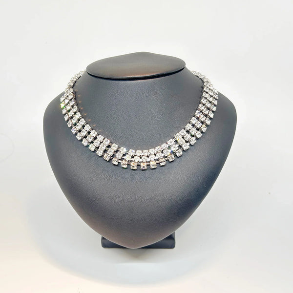 Classic Vintage Three Row Rhinestone Choker: Perfect for an evening out or formal event. Features three rows of radiant prong-set stones. Shop now!