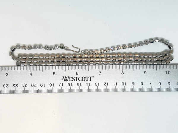 Classic Vintage Three Row Rhinestone Choker: Perfect for an evening out or formal event. Features three rows of radiant prong-set stones. Shop now!