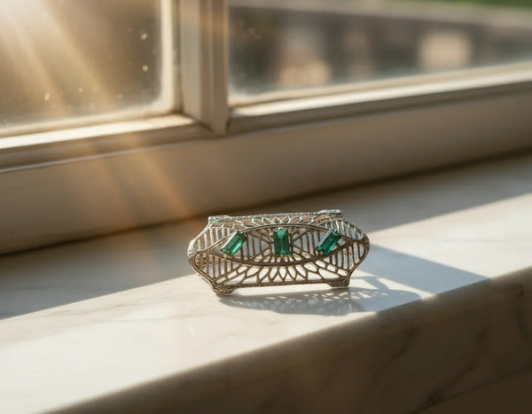 Perfect for vintage jewelry lovers: our Subtle Vintage Art Deco Bar Pin with green stones provides timeless elegance and sophistication. Shop today!
