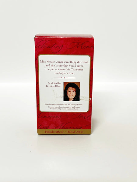 Perfect for ornament collectors: our Hallmark Keepsake Ornament "Tending Her Topiary" (2000) provides charming, detailed holiday decor. Shop today!