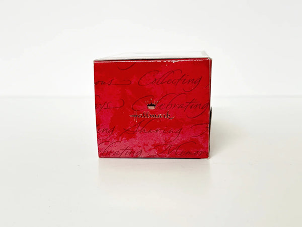 Perfect for ornament collectors: our Hallmark Keepsake Ornament "Tending Her Topiary" (2000) provides charming, detailed holiday decor. Shop today!