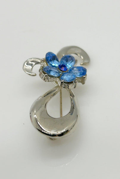 Vintage Silver Bow Brooch with Blue Stones - Lamoree’s Vintage